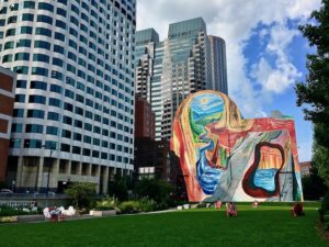 a mural by Shara Hughes called “Carving Out Fresh Options” in Dewey Square, Boston